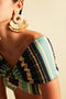 Model wearing Ornella Earrings Beige by Juan de Dios Swimwear